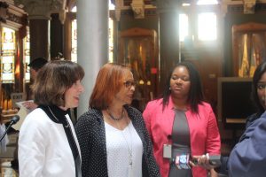 Judge Bernadette Conway, Representative Toni Walker, and Secretary of State Melissa McCaw speak to press at the Council of State Governments IOYouth Kickoff